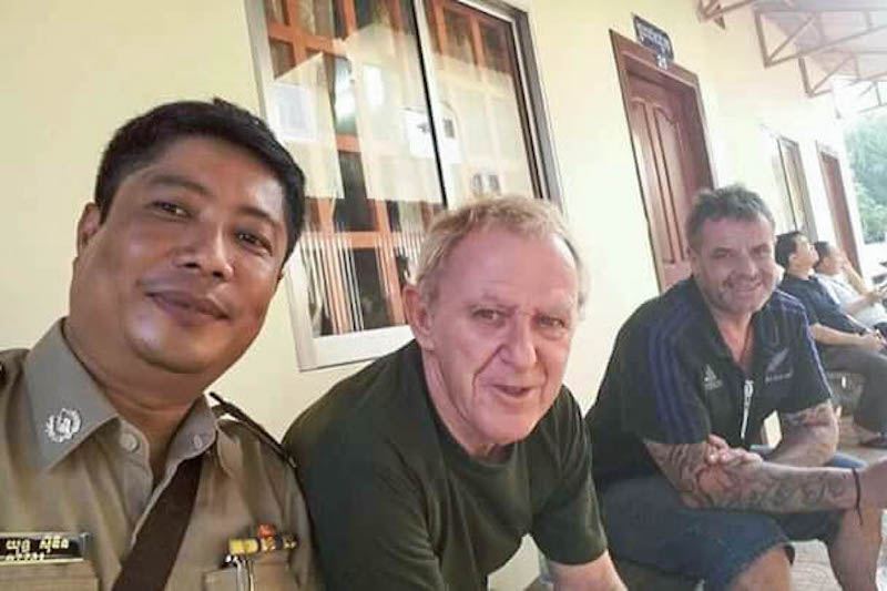 James An and Cambodian Police Officer